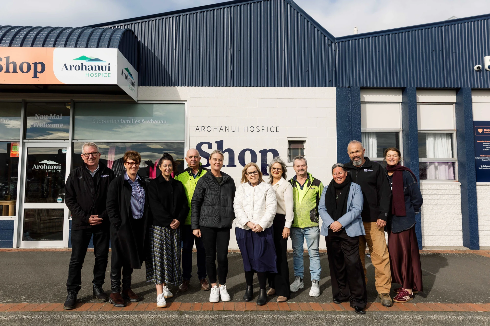 The local business supporters and Arohanui Hospice team gathered outside the refreshed Feilding shop