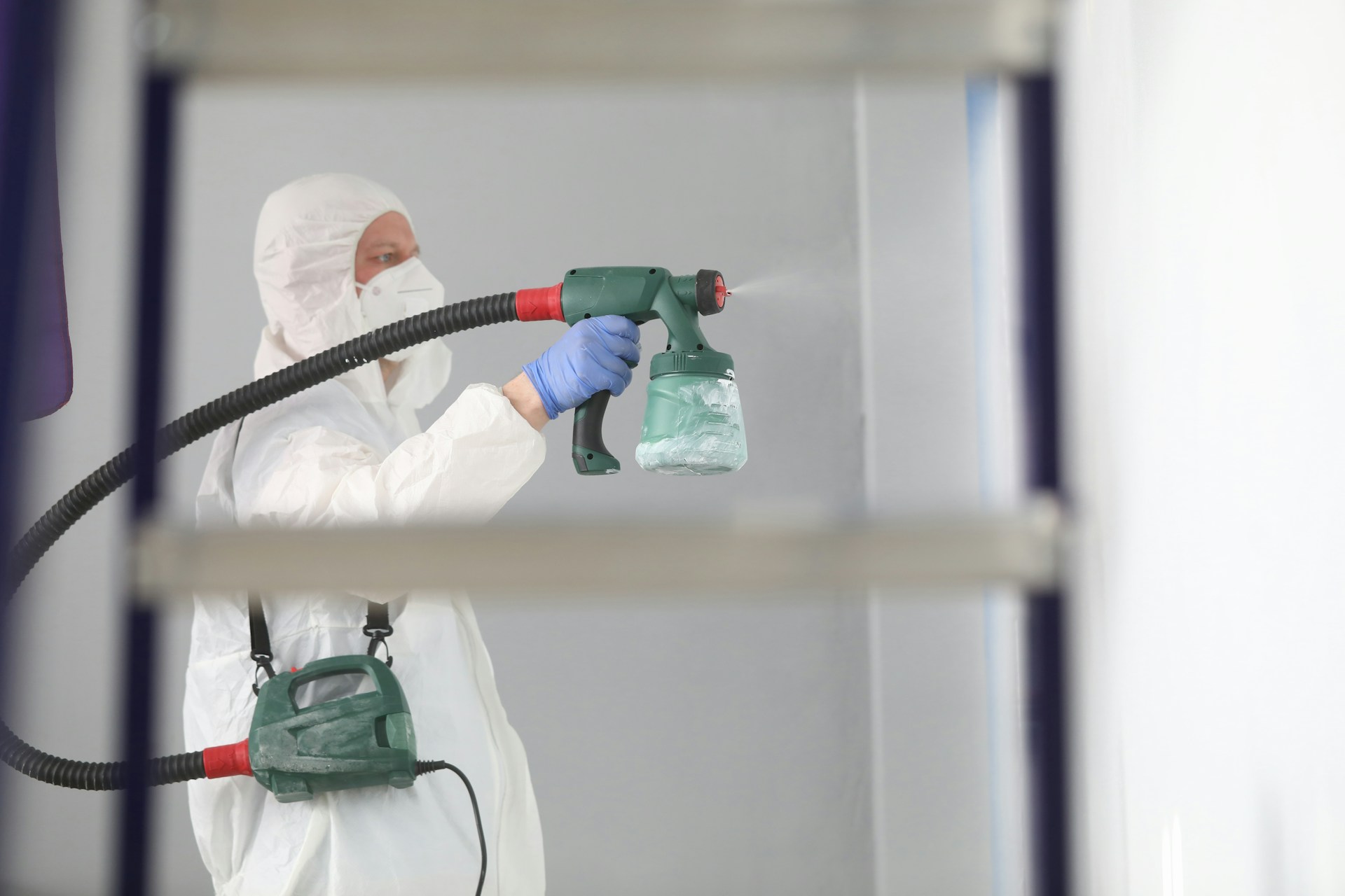 Industrial coating being applied to a metal structure